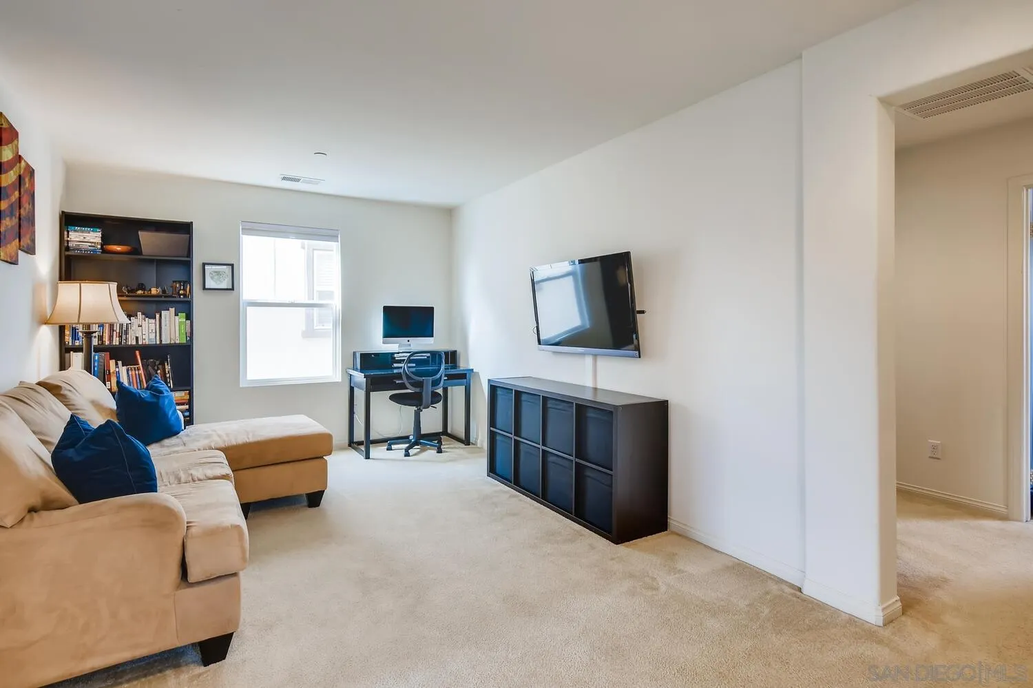 1223 Mason Road Chula Vista, CA 91913 - Photo 21 of 24 a living room with furniture and a flat screen tv