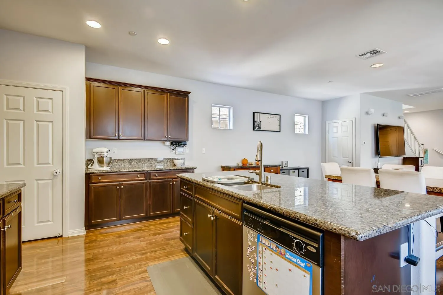 1223 Mason Road Chula Vista, CA 91913 - Photo 9 of 24 a kitchen with a sink stove and cabinets