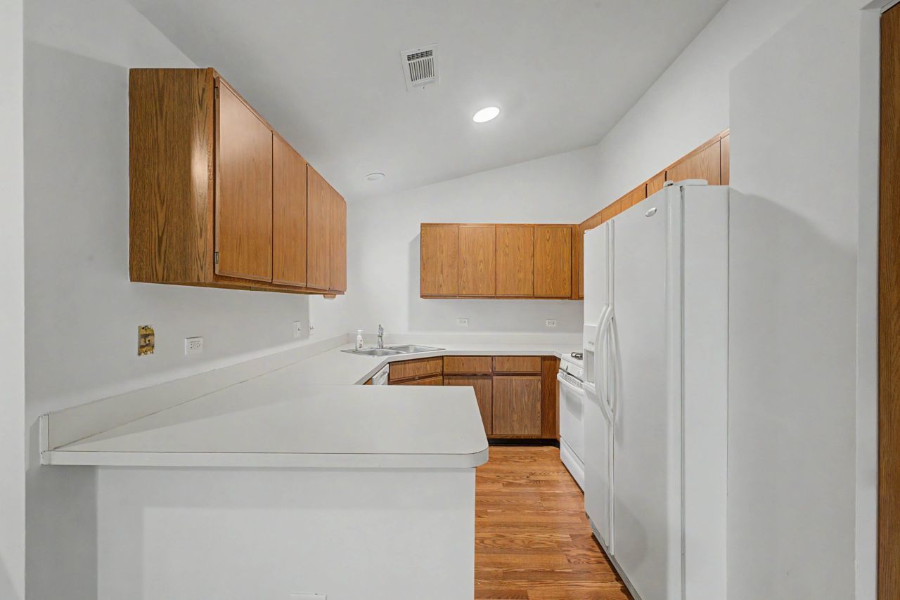 1953 North Coldspring Road Arlington Heights, IL 60004 - Photo 12 of 27 a bathroom with a sink and a mirror