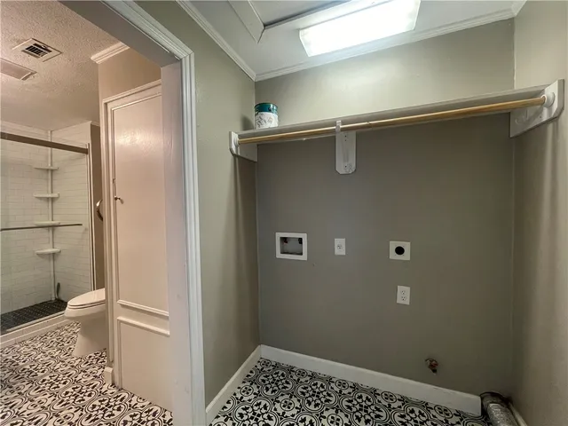 a bathroom with a glass door shower