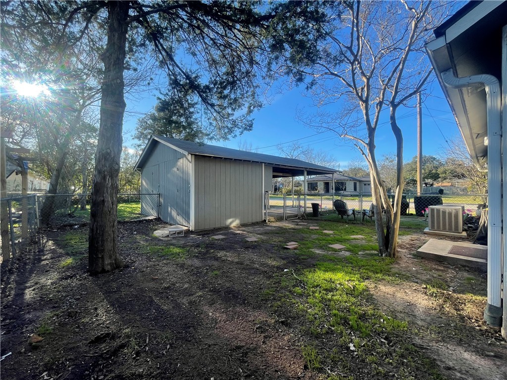 1900 Echols Street, Unit B Bryan, TX 77801 - Photo 7 of 9 a view of a house with a yard