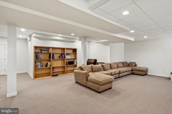 a room with furniture and a window