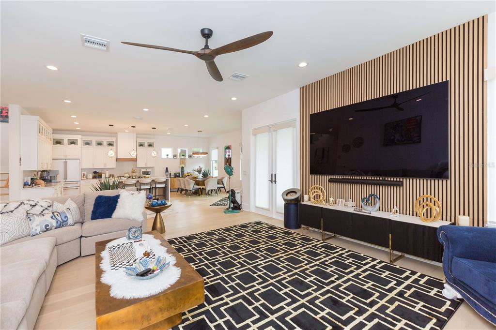 1304 West Arch Street Tampa, FL 33607 - Photo 33 of 75 a living room with furniture and a flat screen tv