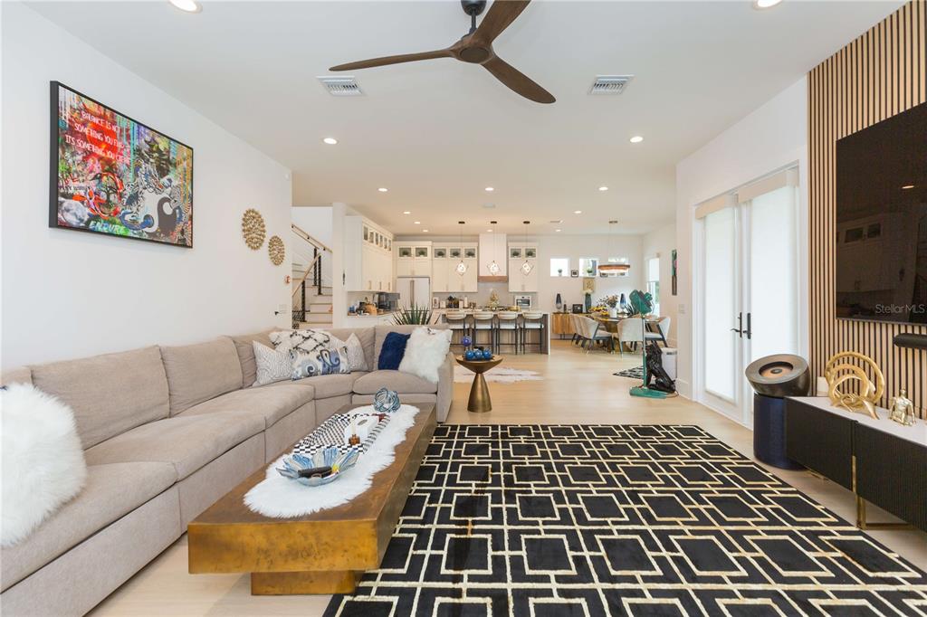 1304 West Arch Street Tampa, FL 33607 - Photo 34 of 75 a living room with furniture a rug and a flat screen tv