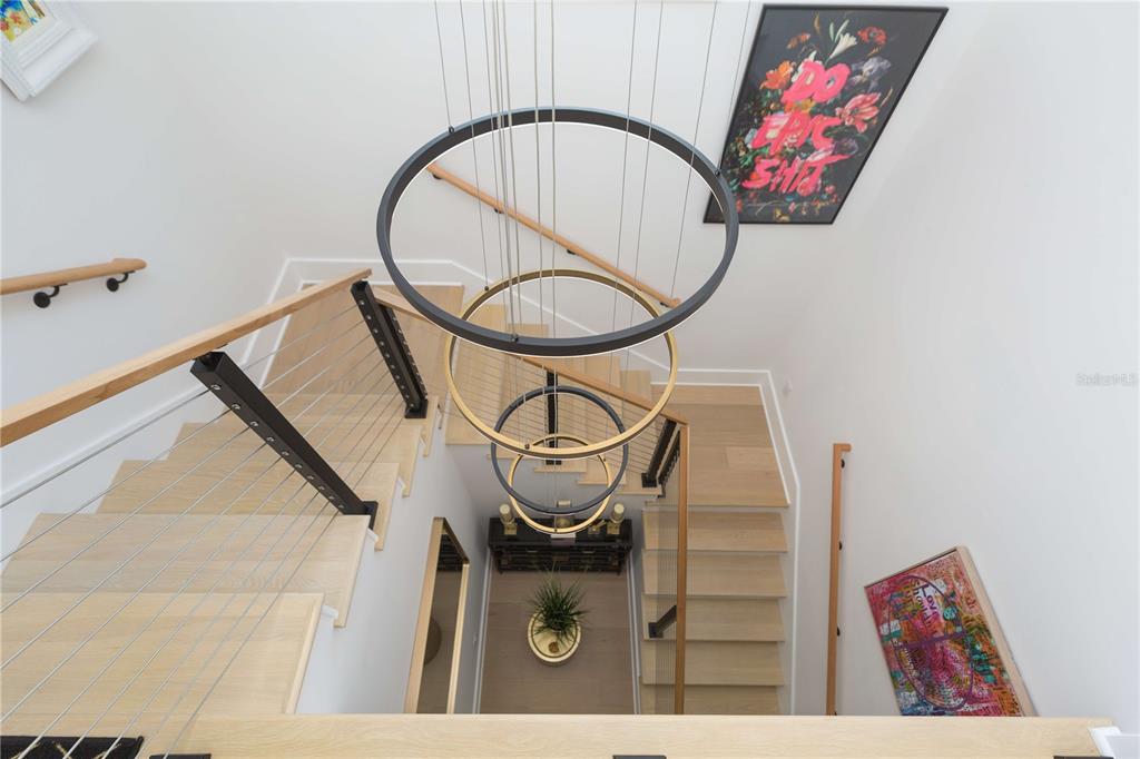 1304 West Arch Street Tampa, FL 33607 - Photo 44 of 75 a picture of a room with wooden floor and white walls