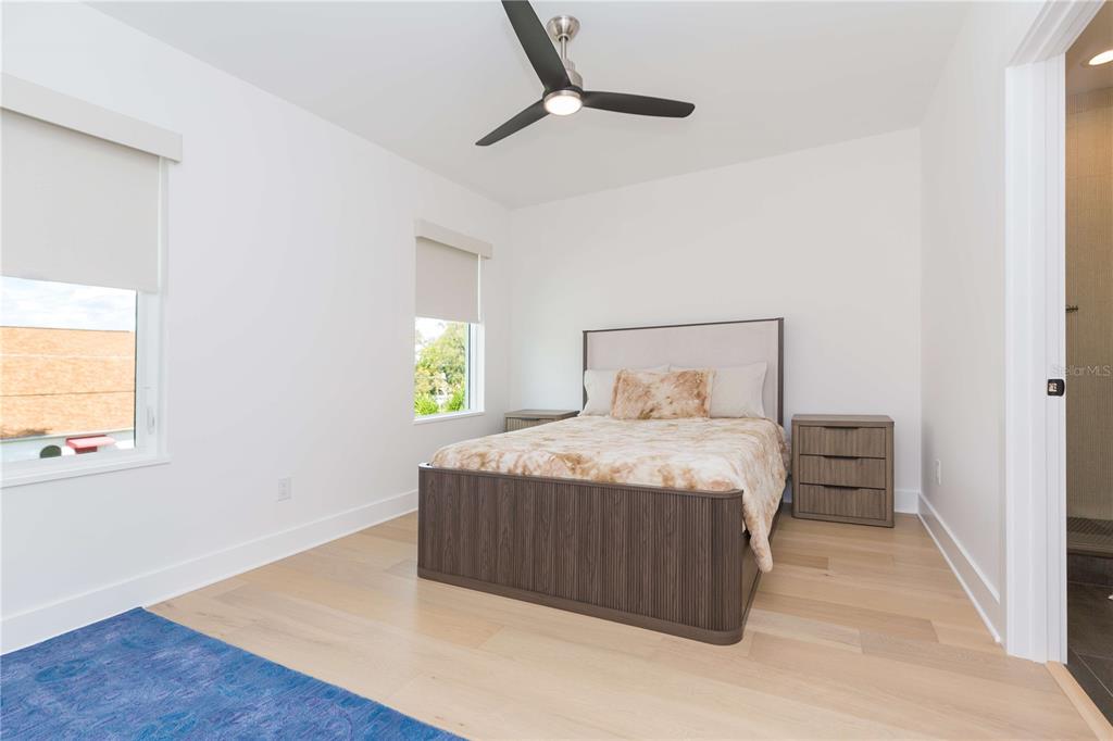 1304 West Arch Street Tampa, FL 33607 - Photo 48 of 75 a bedroom with a bed and a window