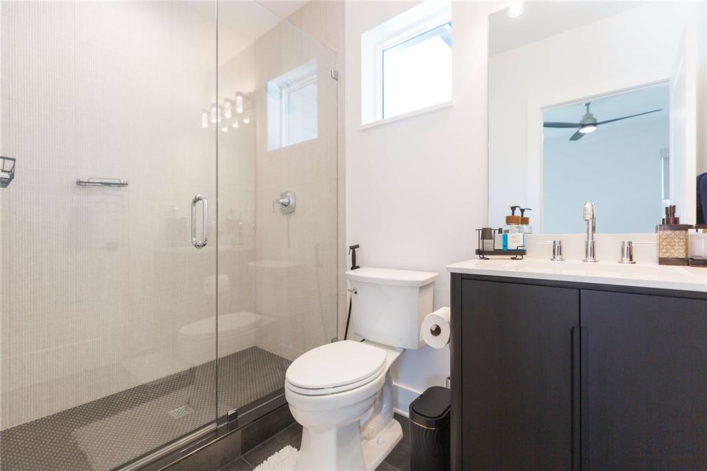 1304 West Arch Street Tampa, FL 33607 - Photo 51 of 75 a bathroom with a sink toilet and shower