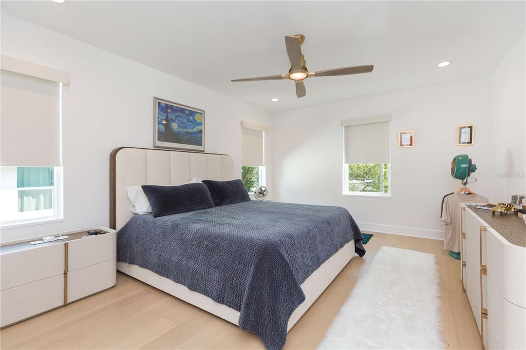 1304 West Arch Street Tampa, FL 33607 - Photo 60 of 75 a bedroom with a bed dresser and a window