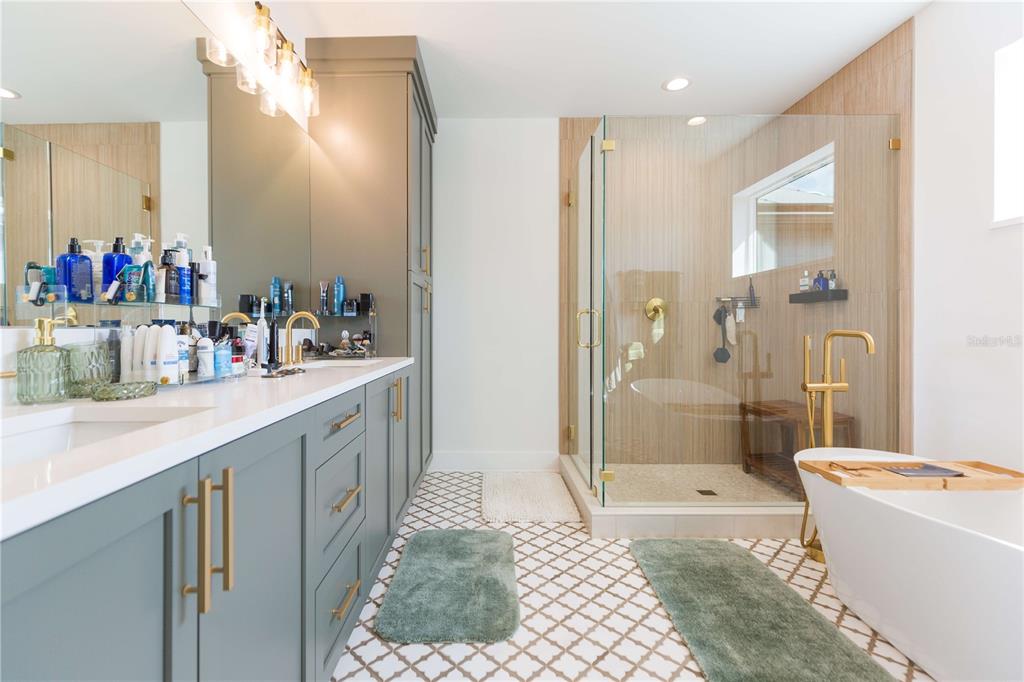 1304 West Arch Street Tampa, FL 33607 - Photo 64 of 75 a bathroom with a tub sink shower and a mirror