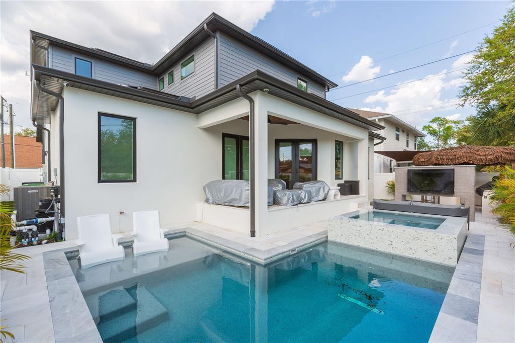 1304 West Arch Street Tampa, FL 33607 - Photo 7 of 75 a view of living room with furniture and a fireplace