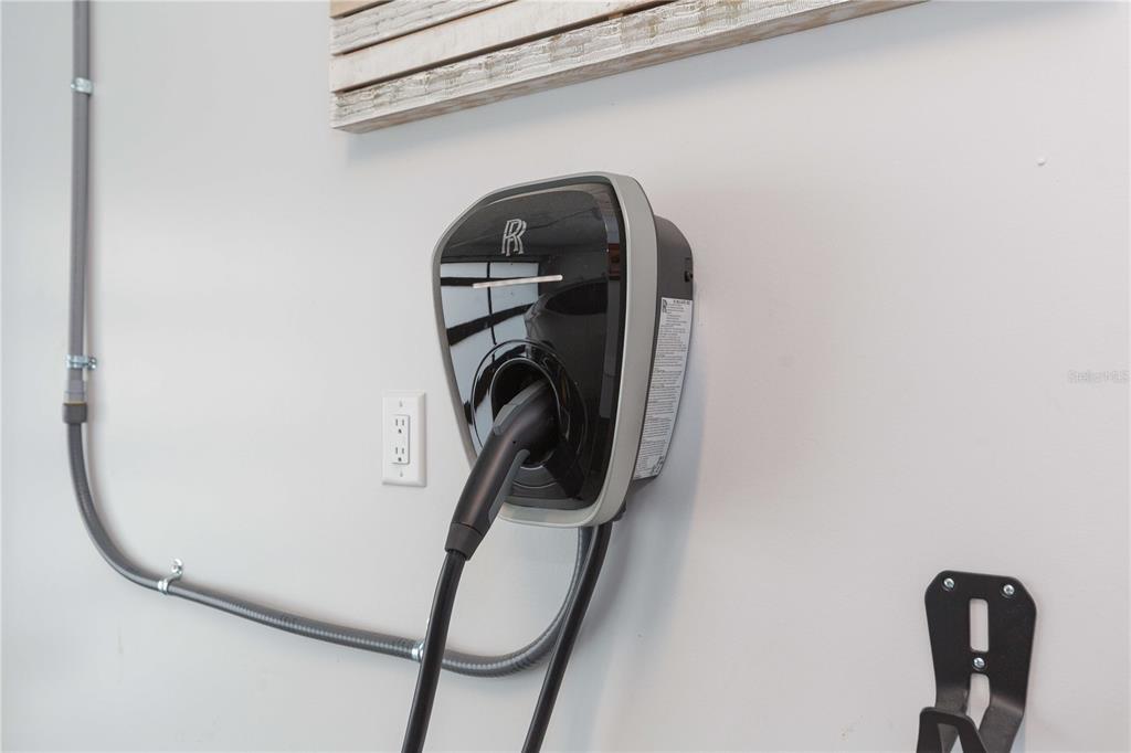 1304 West Arch Street Tampa, FL 33607 - Photo 73 of 75 a close view of a washer dryer and washer in a shelf