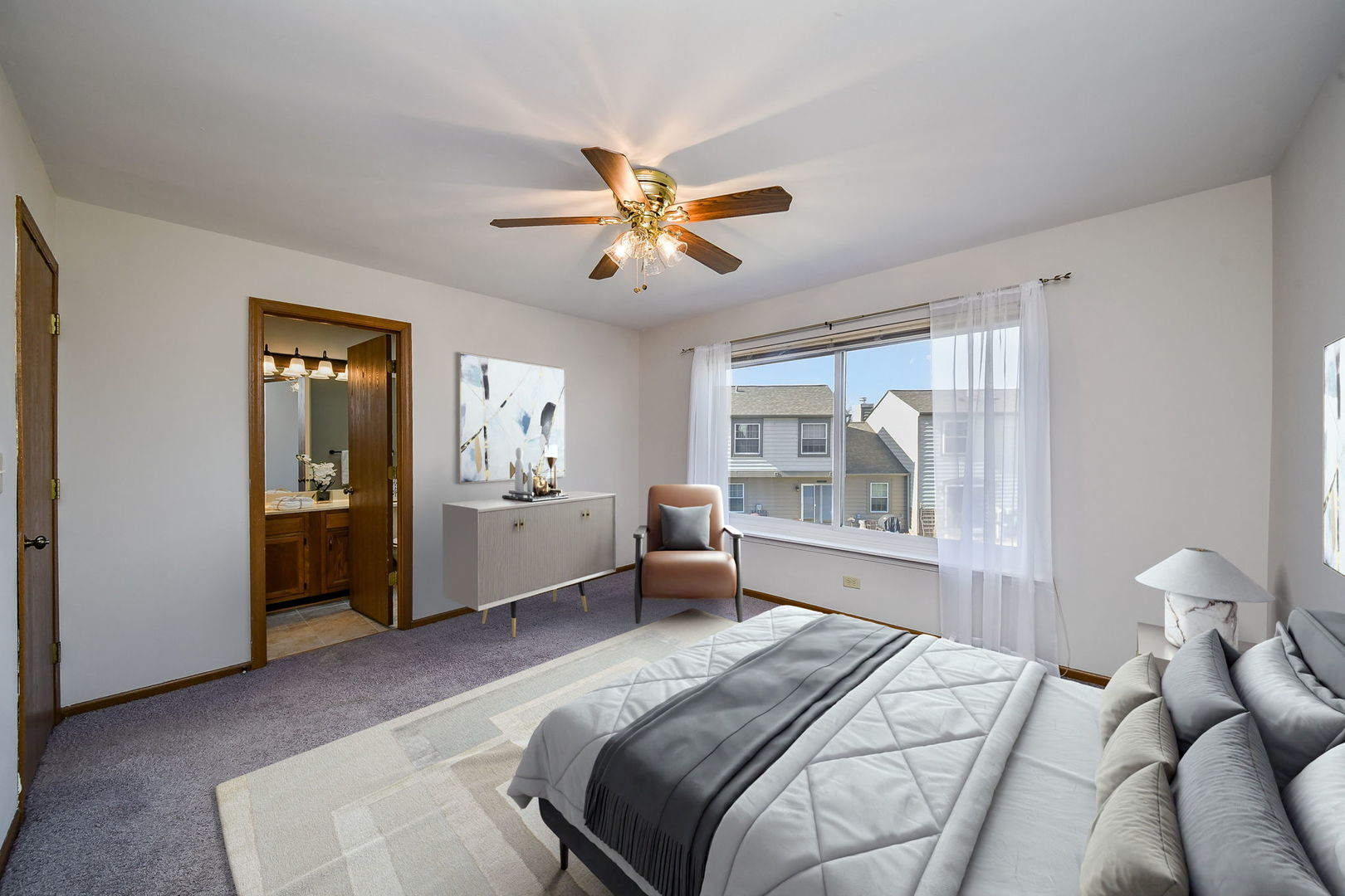 1266 Seabury Circle Carol Stream, IL 60188 - Photo 14 of 22 a bedroom with a bed and a chandelier