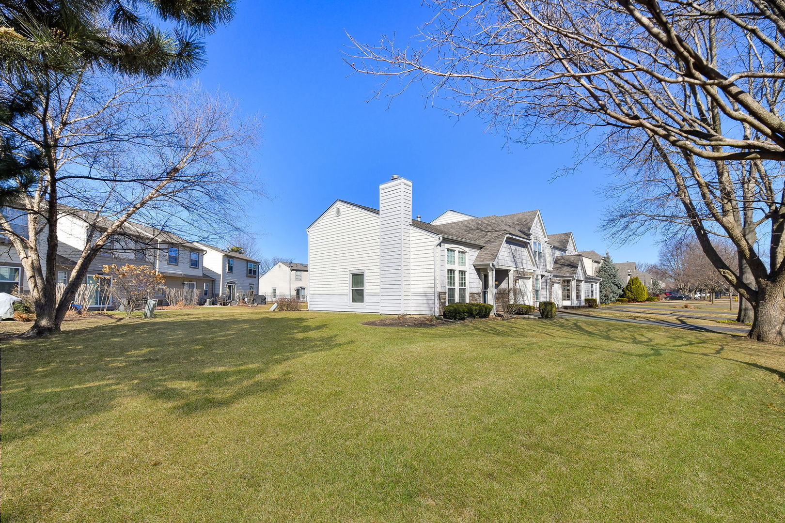 1266 Seabury Circle Carol Stream, IL 60188 - Photo 2 of 22 a view of a yard with a house
