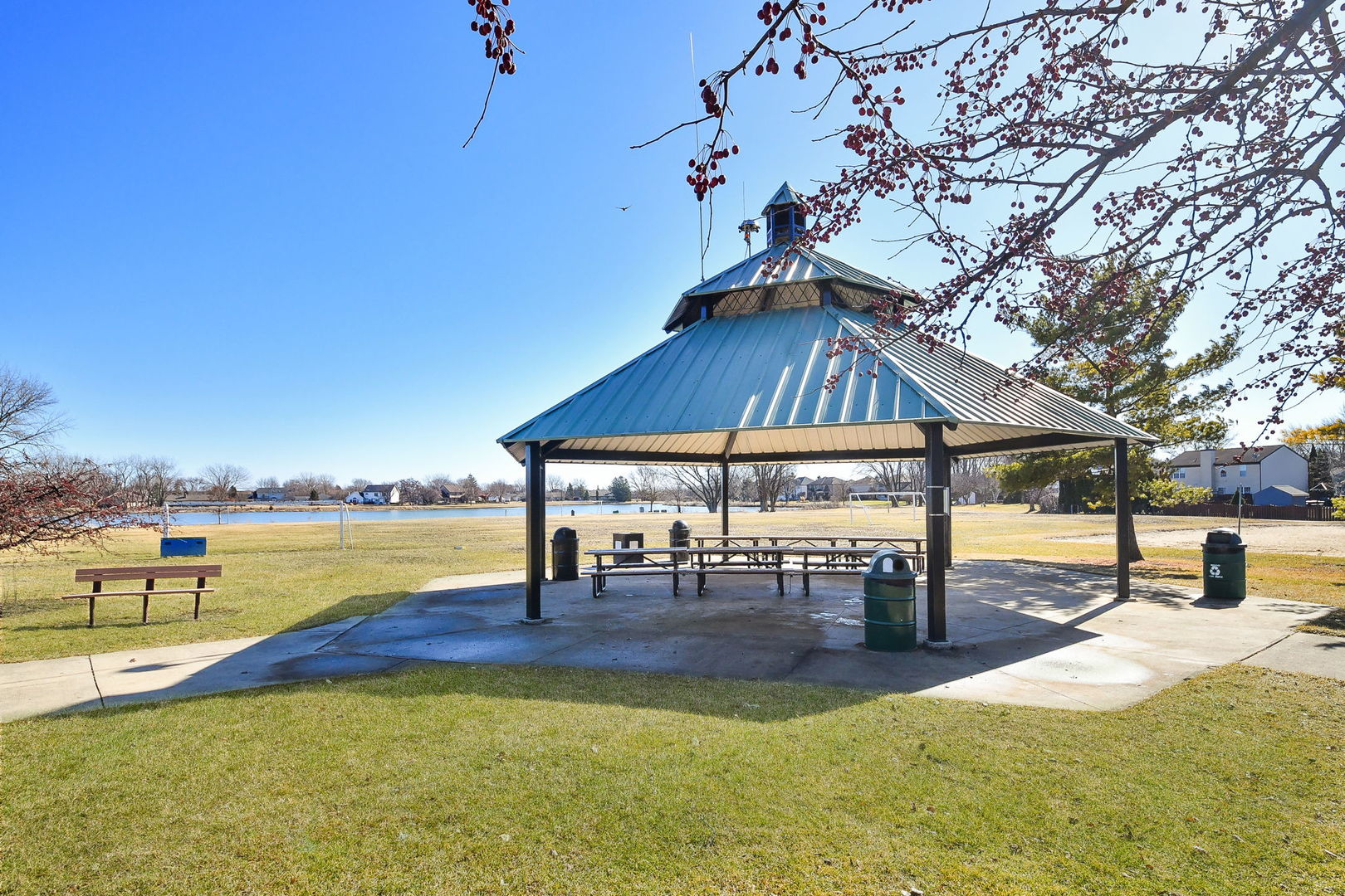 1266 Seabury Circle Carol Stream, IL 60188 - Photo 21 of 22 a view of a swimming pool with a table and chairs