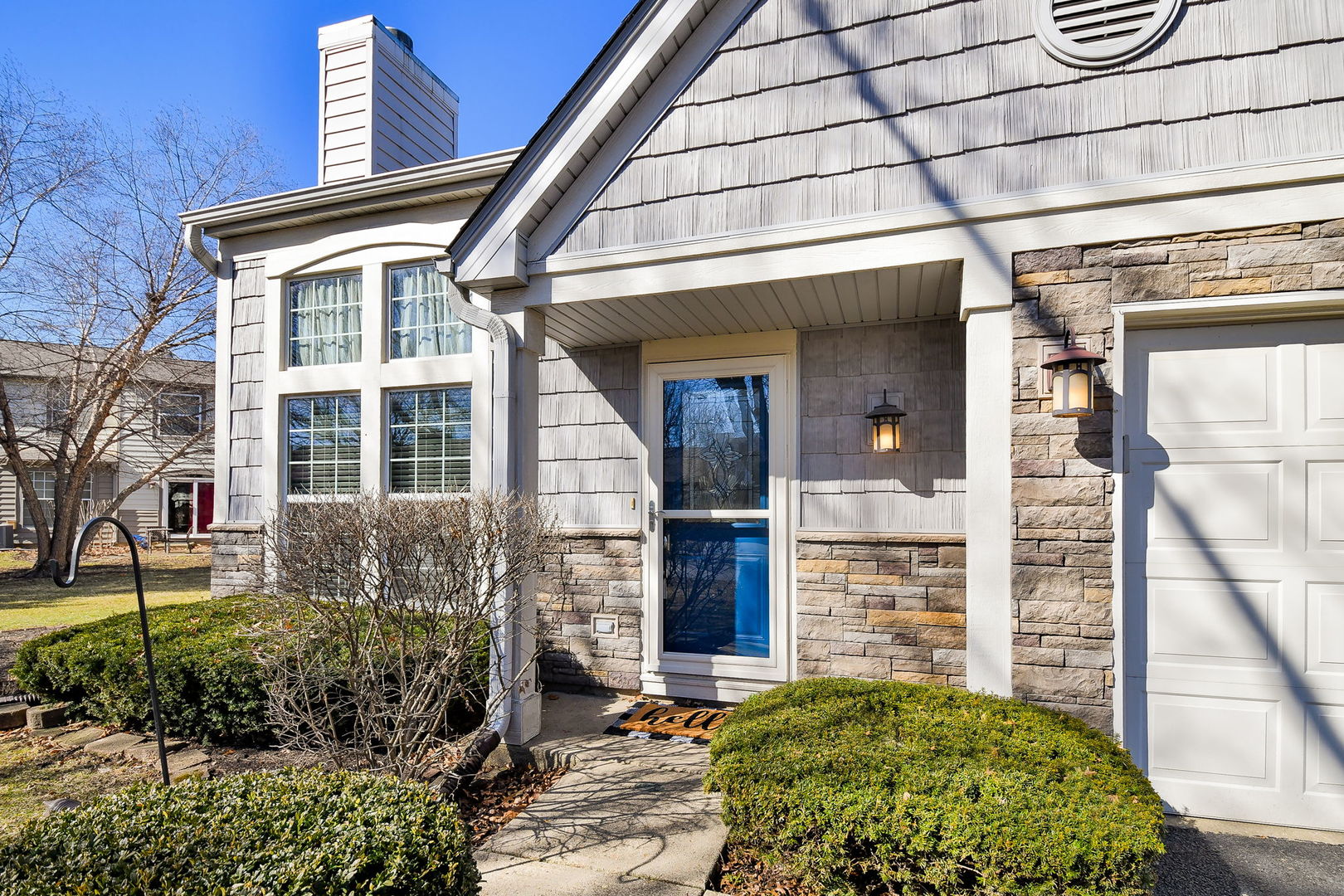 1266 Seabury Circle Carol Stream, IL 60188 - Photo 5 of 22 a view of a brick house with a large windows
