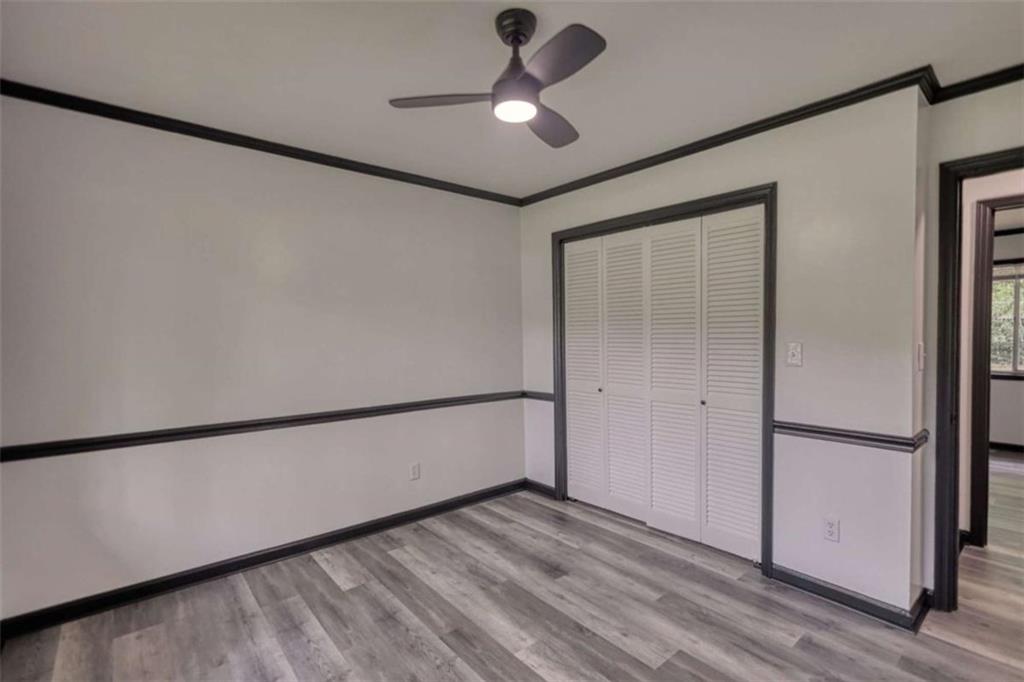 555 Joy Street Jackson, GA 30233 - Photo 38 of 56 a view of empty room with ceiling fan