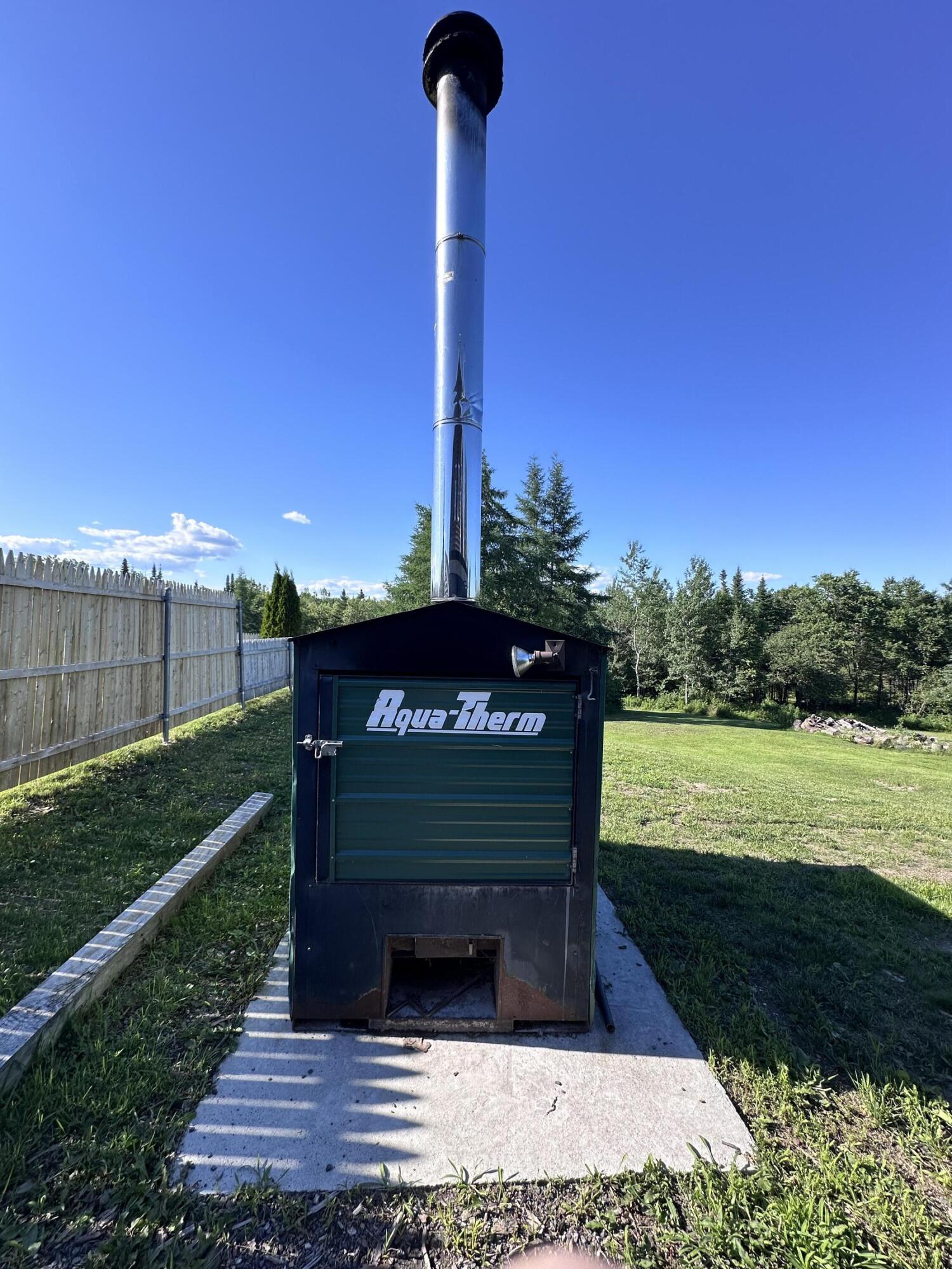 178 Potter Road Hudson, ME 04449 - Photo 51 of 54 Outdoor Wood Boiler