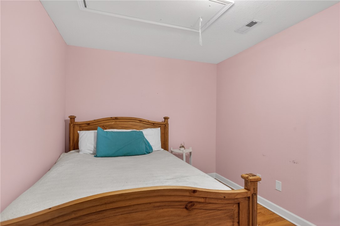 151 Towne Creek Trail Anderson, SC 29621 - Photo 21 of 49 A well-maintained bedroom offers ample personal space with rich wooden floors.