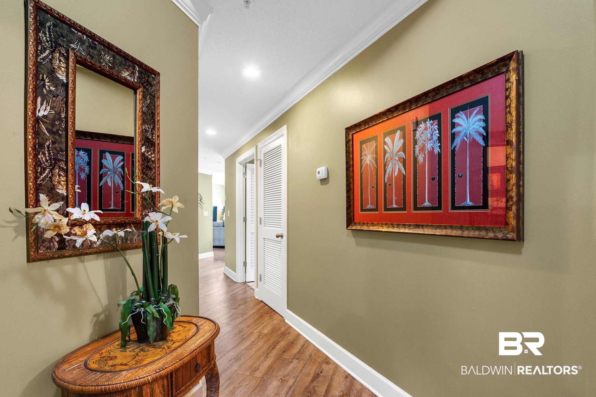 27580 Canal Road, Unit 1214 AND BOAT SLIP #62 Orange Beach, AL 36561 - Photo 5 of 67 Hall featuring recessed lighting, baseboards, crown molding, and wood finished floors
