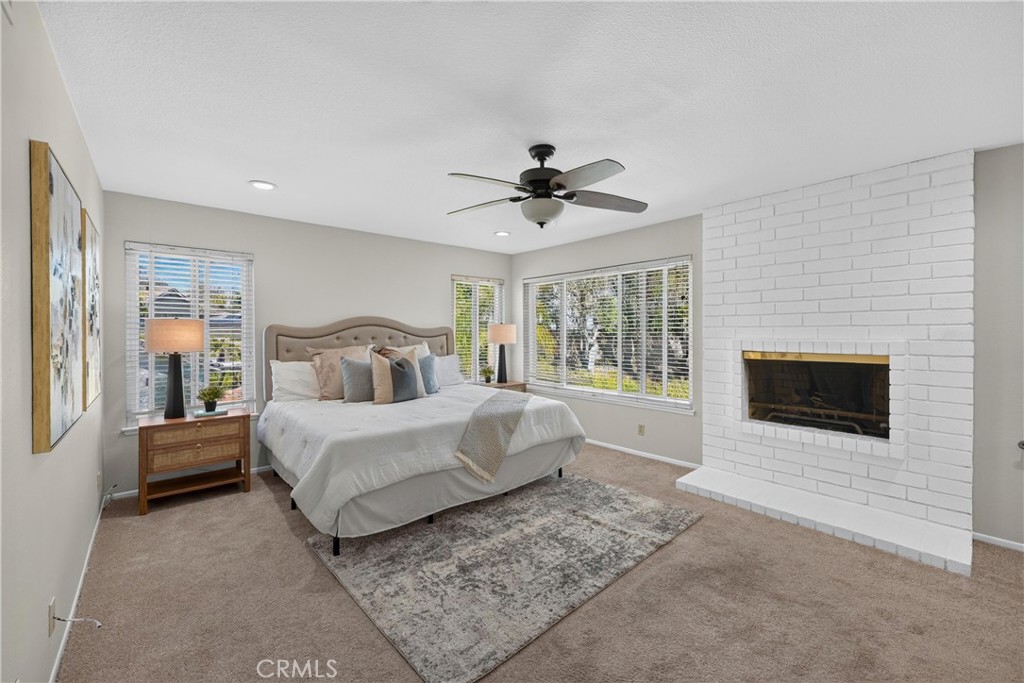 2935 Bluebell Avenue Brea, CA 92821 - Photo 19 of 38 Unwind in the primary suite with its own fireplace and en-suite bathroom