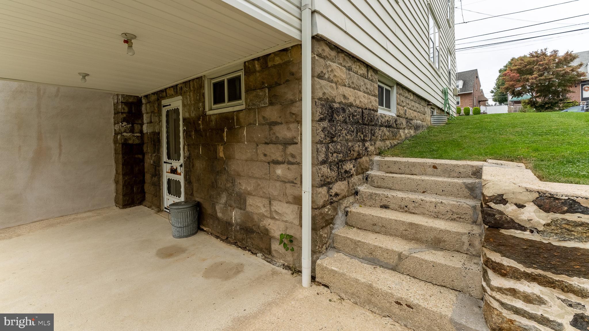 218 Haverford Road Folsom, PA 19033 - Photo 25 of 27 Covered Patio & Entrance to Full Basement