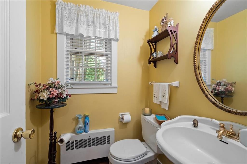 870 Field Club Road Pittsburgh, PA 15238 - Photo 15 of 19 a bathroom with a sink mirror vanity and toilet