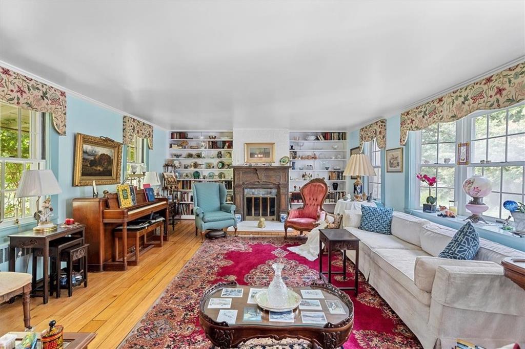 870 Field Club Road Pittsburgh, PA 15238 - Photo 5 of 19 a living room with furniture and a flat screen tv