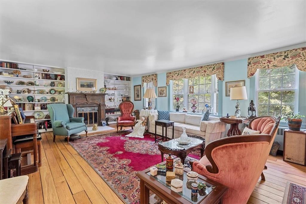 870 Field Club Road Pittsburgh, PA 15238 - Photo 6 of 19 a living room with furniture and a fireplace