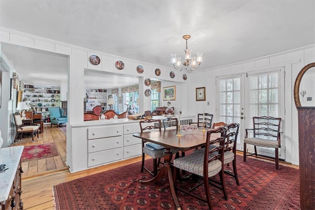 870 Field Club Road Pittsburgh, PA 15238 - Photo 8 of 19 a view of a dining room with furniture and chandelier