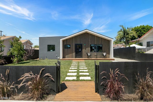 swimming pool view with a seating space