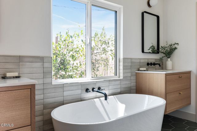 a bathroom with a sink and a bathtub