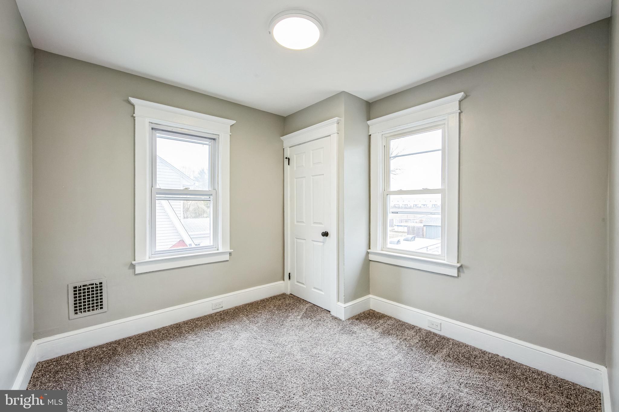 409 Neck Road Burlington, NJ 08016 - Photo 20 of 27 an empty room with windows