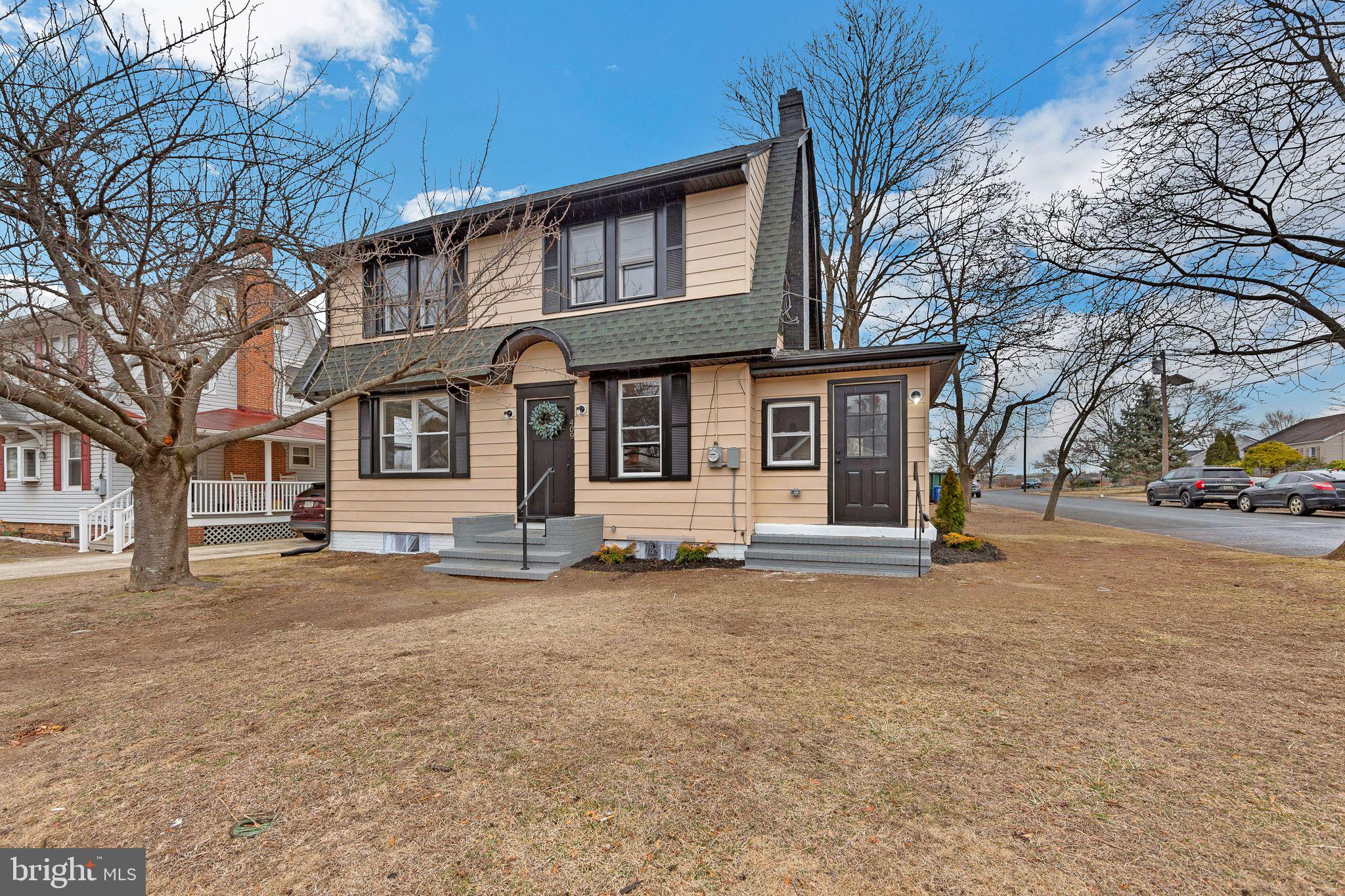 409 Neck Road Burlington, NJ 08016 - Photo 2 of 27 a view of a house with a large tree in front of it