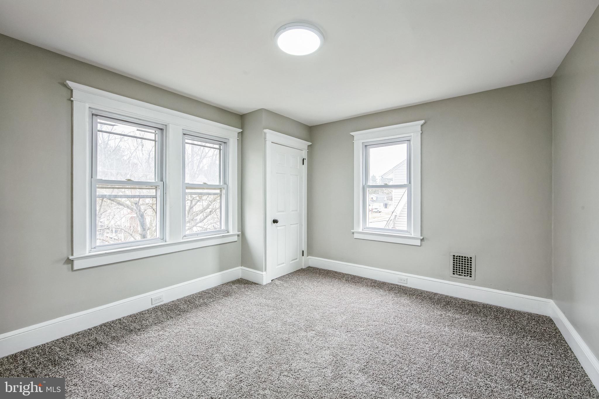 409 Neck Road Burlington, NJ 08016 - Photo 21 of 27 an empty room with windows