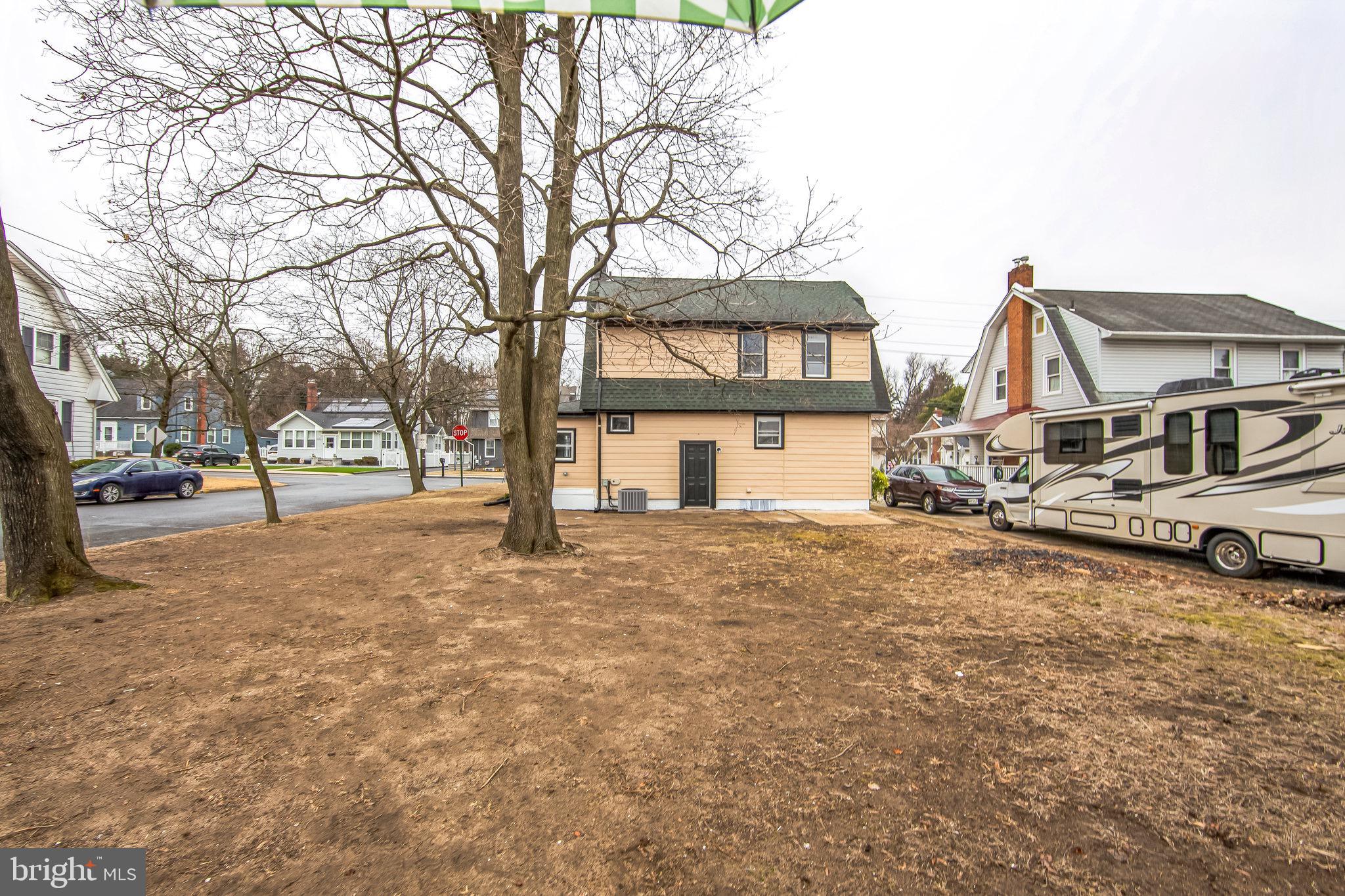 409 Neck Road Burlington, NJ 08016 - Photo 26 of 27 a house with trees in front of it