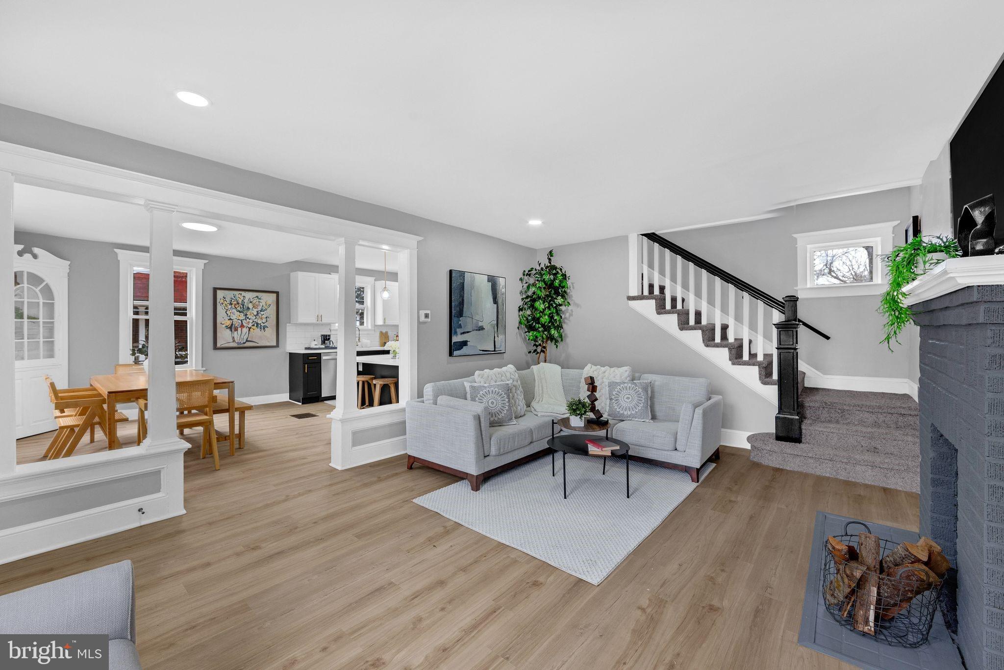 409 Neck Road Burlington, NJ 08016 - Photo 4 of 27 a living room with furniture and a table with wooden floor