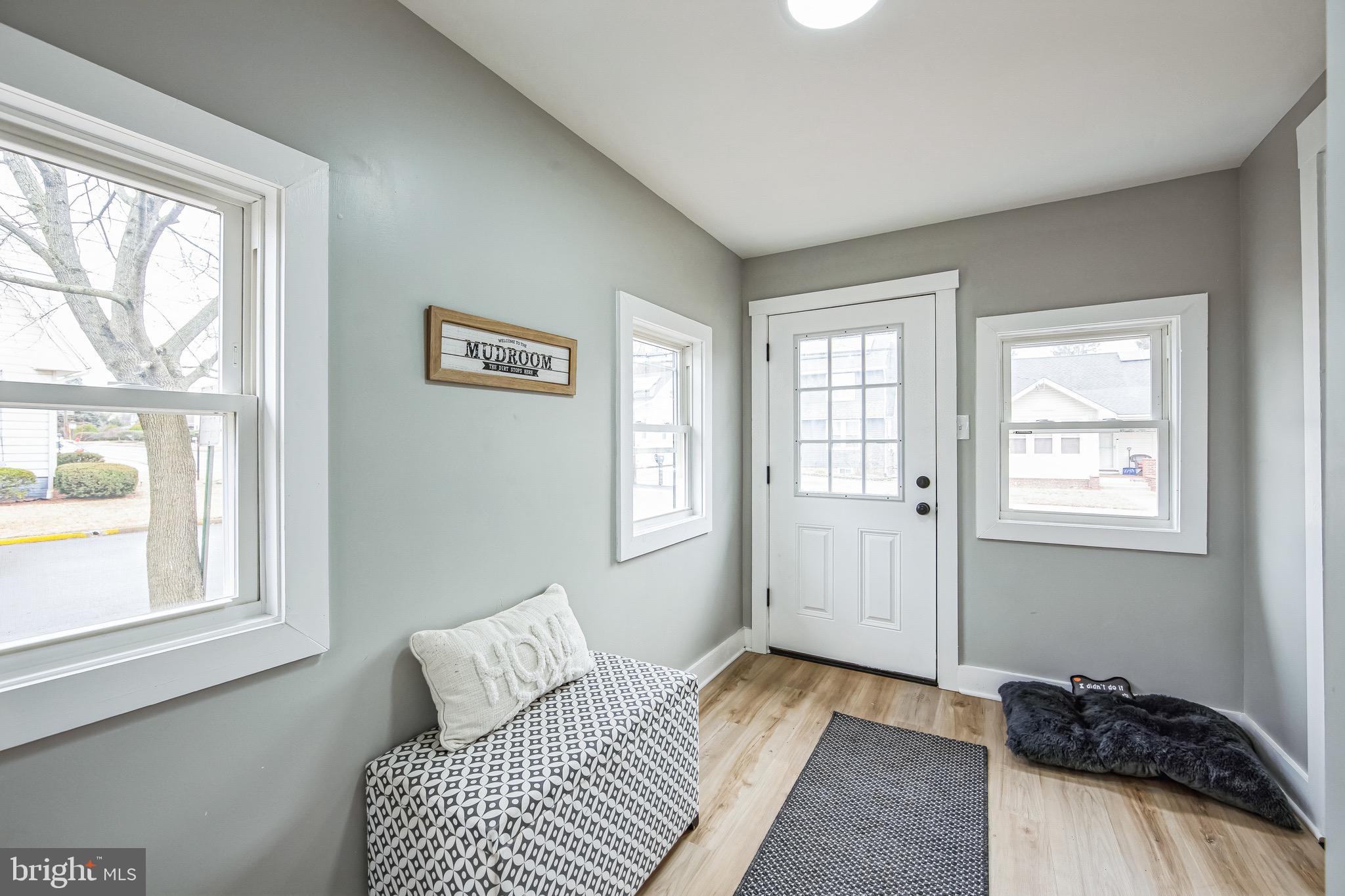 409 Neck Road Burlington, NJ 08016 - Photo 8 of 27 a bedroom with a bed and wooden floor