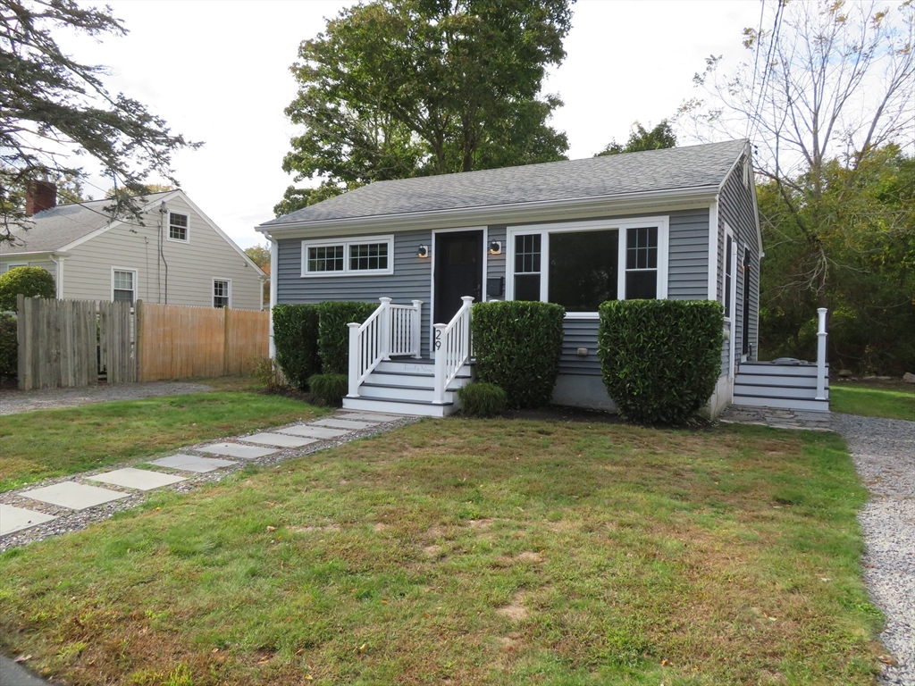 29 Davis Street Dartmouth, MA 02748 - Photo 1 of 12 a front view of house with yard and green space