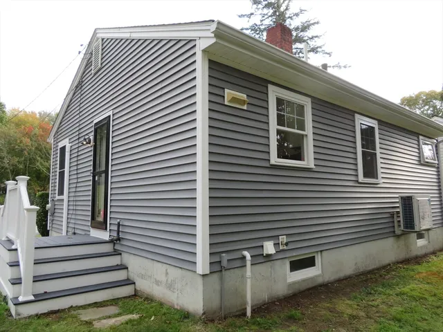 a front view of a house with a garage