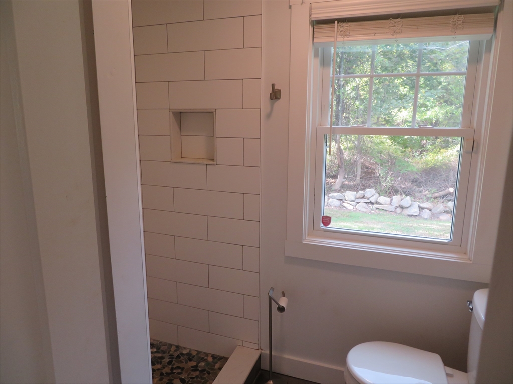 29 Davis Street Dartmouth, MA 02748 - Photo 7 of 12 a bathroom with a toilet