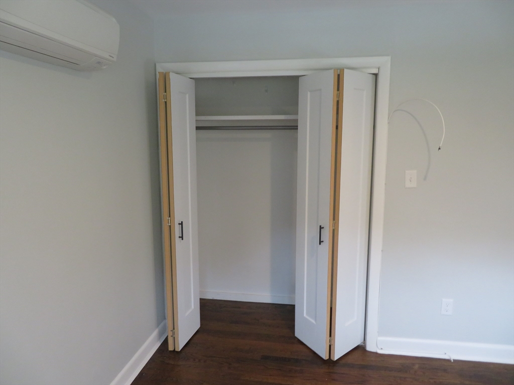 29 Davis Street Dartmouth, MA 02748 - Photo 10 of 12 a view of a hallway with wooden floor