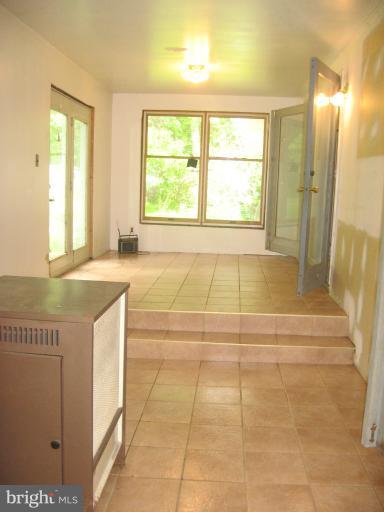 718 Senseny Road Berryville, VA 22611 - Photo 3 of 25 Unfinished Sunroom