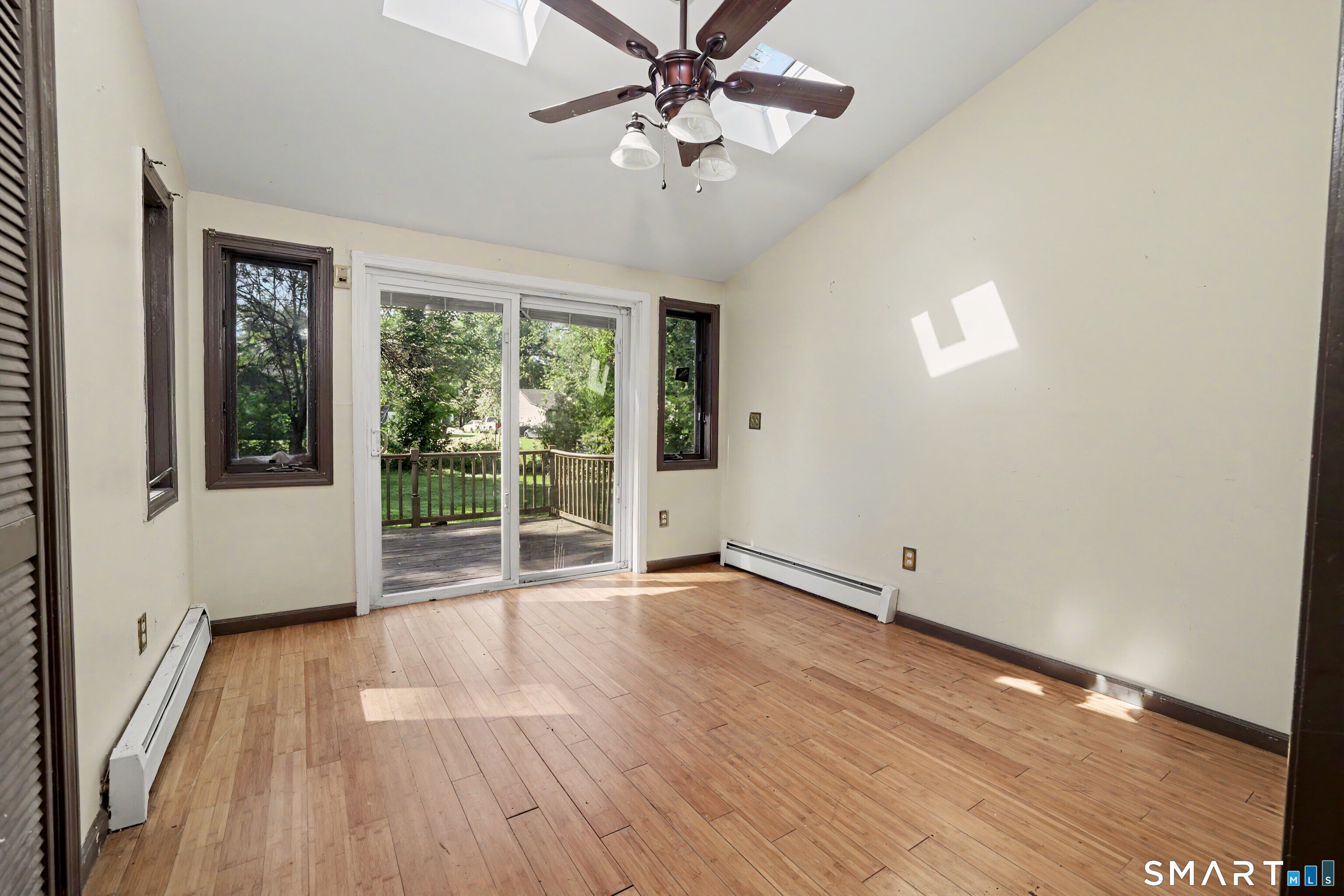 97 Boothbay Street Bloomfield, CT 06002 - Photo 19 of 33 wooden floor in an empty room with a window