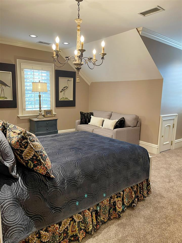 500 Eden Brooke Farm Road Bells, TN 38006 - Photo 14 of 19 a bedroom with a bed mirror and window