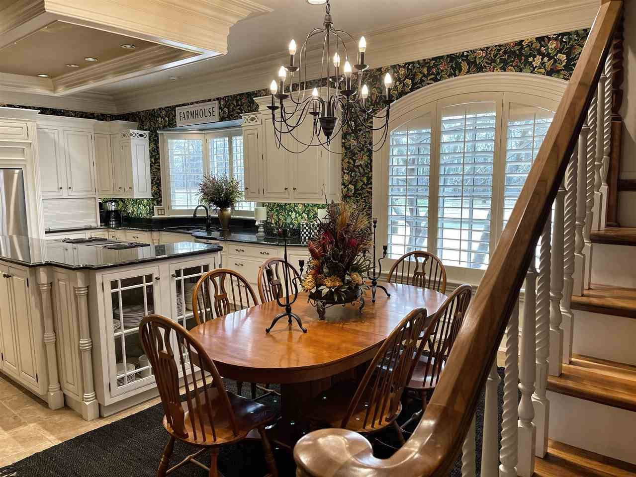 500 Eden Brooke Farm Road Bells, TN 38006 - Photo 17 of 19 a view of a dining room with furniture window and wooden floor