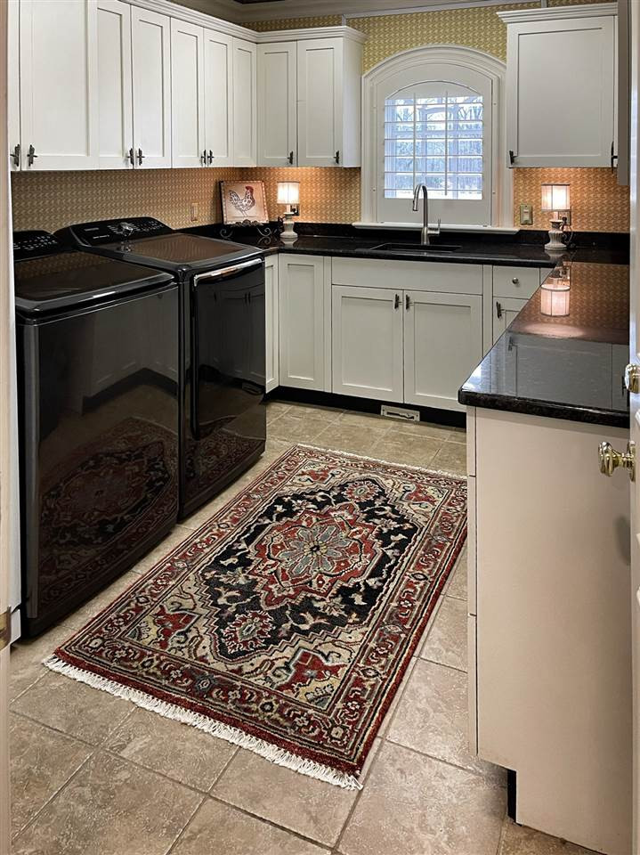 500 Eden Brooke Farm Road Bells, TN 38006 - Photo 18 of 19 a kitchen with stainless steel appliances granite countertop a sink stove and cabinets
