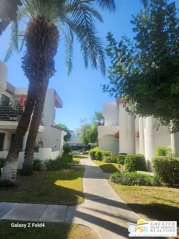 a view of a yard in front of the house