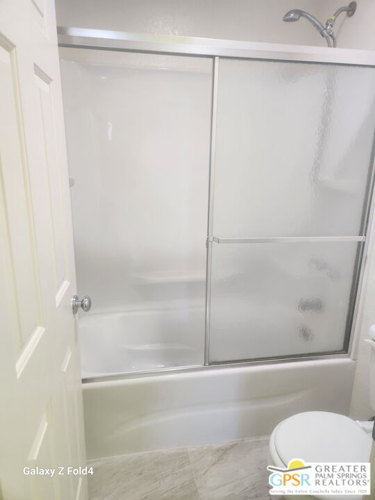 401 El Cielo Road, Unit 93 Palm Springs, CA 92262 - Photo 7 of 17 a bathroom with a shower