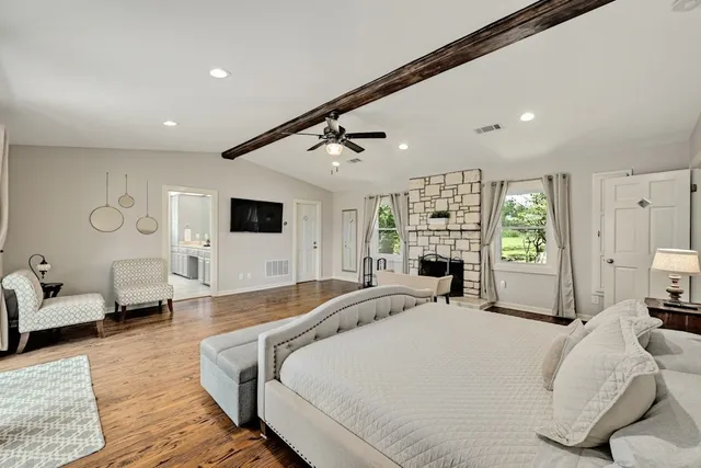a view of a chairs and table in a patio