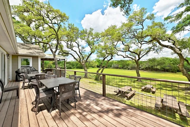 a bathroom with a shower and a sink